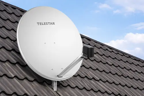 telestar_antennen_kategorie Satellitenantenne von TELESTAR auf dem Hausdach montiert